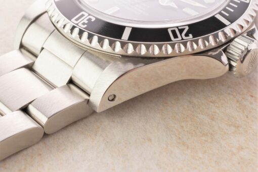 14060M Submariner No Date (V serial / LC 100 / rehaut / full set) – Bild 9