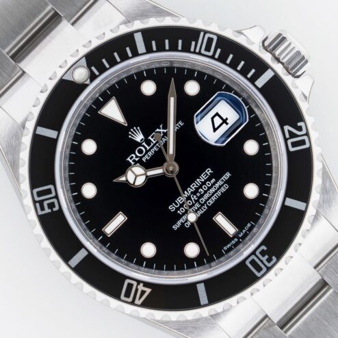 16610 Submariner Date (NOS stickers / full set / random serial / rehaut)