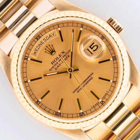 18238 Day-Date (unpolished / top bracelet / golden sunray dial)