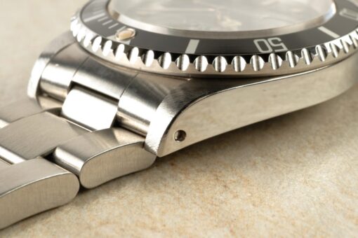 16610 Submariner Date (unpolished / super patina / caseback sticker / box & papers – Bild 10