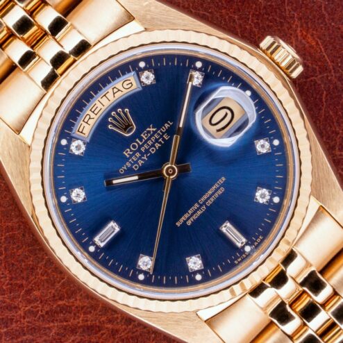 18038 Day-Date (blue diamond sunray dial / box papers LC 100 / 8386 jubilee bracelet)