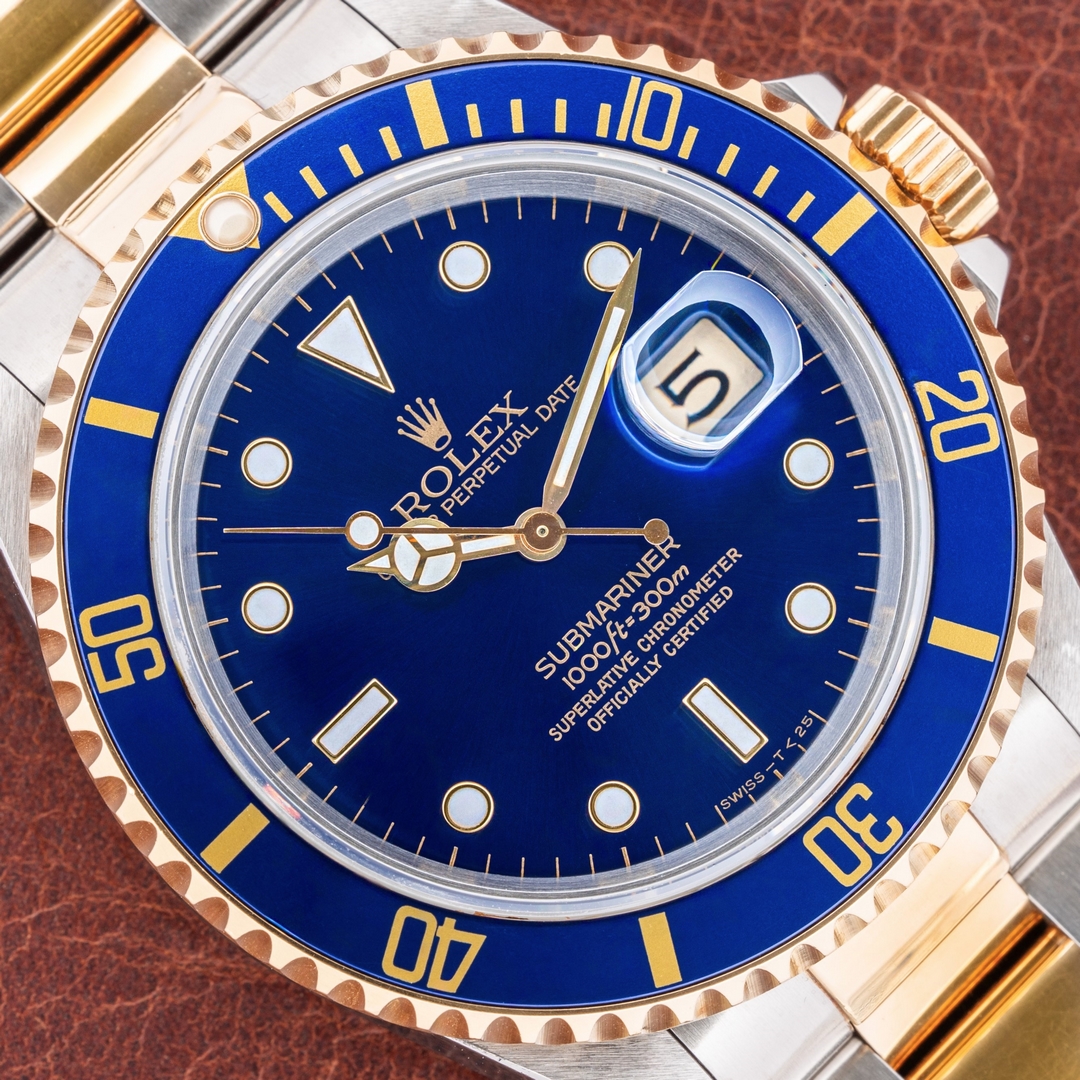 16613 Submariner Date (blue/purple / unpolished / caseback sticker / box and papers)