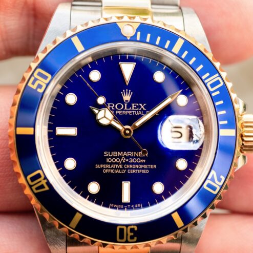 Alternative view of 16613 Submariner Date (blue/purple / unpolished / caseback sticker / box and papers)