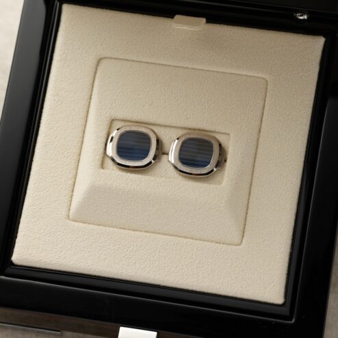 Nautilus style cufflinks (18 carat white gold / new with original box)